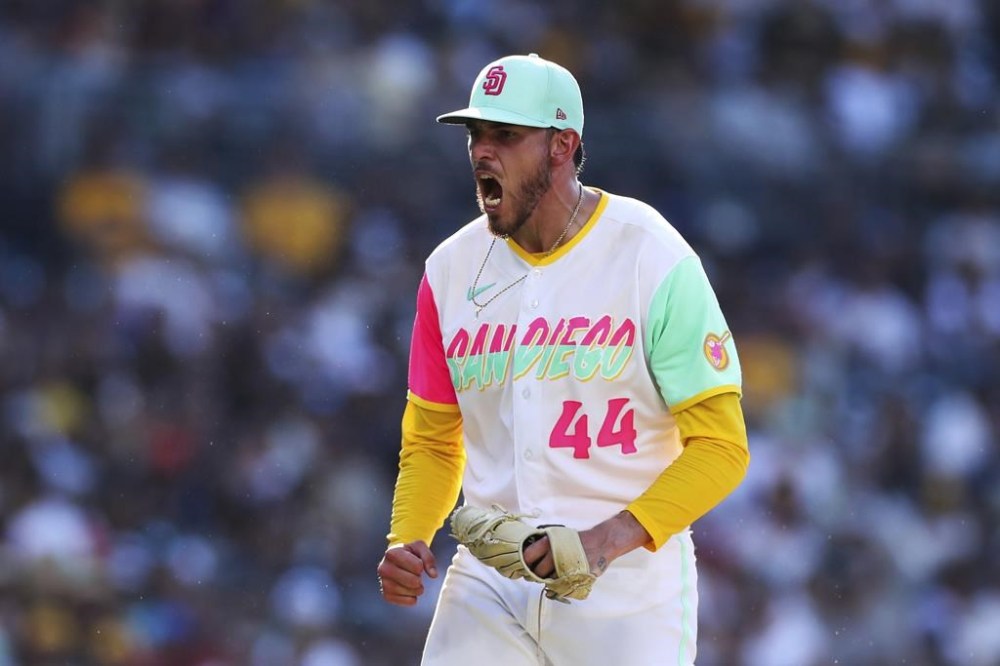 San Diego Padres starting pitcher Joe Musgrove reacts after striking out Minnesota Twins' Carlos Correa during the fifth inning of a baseball game Saturday, July 30, 2022, in San Diego. (AP Photo/Derrick Tuskan)