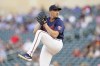 Minnesota Twins starting pitcher Aaron Sanchez winds up during the top of the first inning of a baseball game against the Detroit Tigers in Minneapolis, Monday, Aug. 1, 2022. (AP Photo/Abbie Parr)
