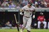 Arizona Diamondbacks' Christian Walker flips his bat after hitting a three-run home run off Cleveland Guardians starting pitcher Cal Quantrill during the fourth inning of a baseball game, Monday, Aug. 1, 2022, in Cleveland. (AP Photo/David Dermer)