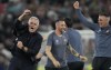FILE - Roma's Jose Mourinho, left, celebrates with his team their victory during the Europa Conference League final between AS Roma and Feyenoord at National Arena in Tirana, Albania, on May 25, 2022. (AP Photo/Antonio Calanni, File)