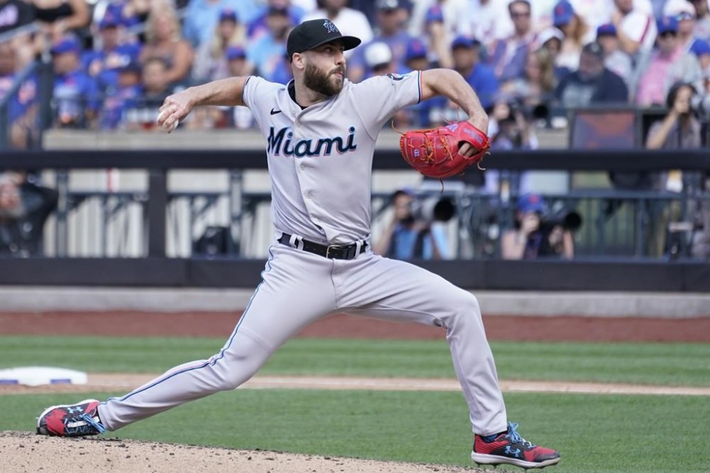 Miami Marlins pitcher Anthony Bass delivers against the New York Mets during the eighth inning of a baseball game in New York, Sunday, July 10, 2022. The Toronto Blue Jays have solidified their bullpen hours before the Major League Baseball trade deadline, acquiring relievers Anthony Bass and Zach Pop from the Miami Marlins for shortstop Jordan Groshans. THE CANADIAN PRESS/AP-Mary Altaffer