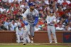 Chicago Cubs' Willson Contreras watches his triple against the St. Louis Cardinals during the third inning of a baseball game Tuesday, Aug. 2, 2022, in St. Louis. (AP Photo / Scott Kane)