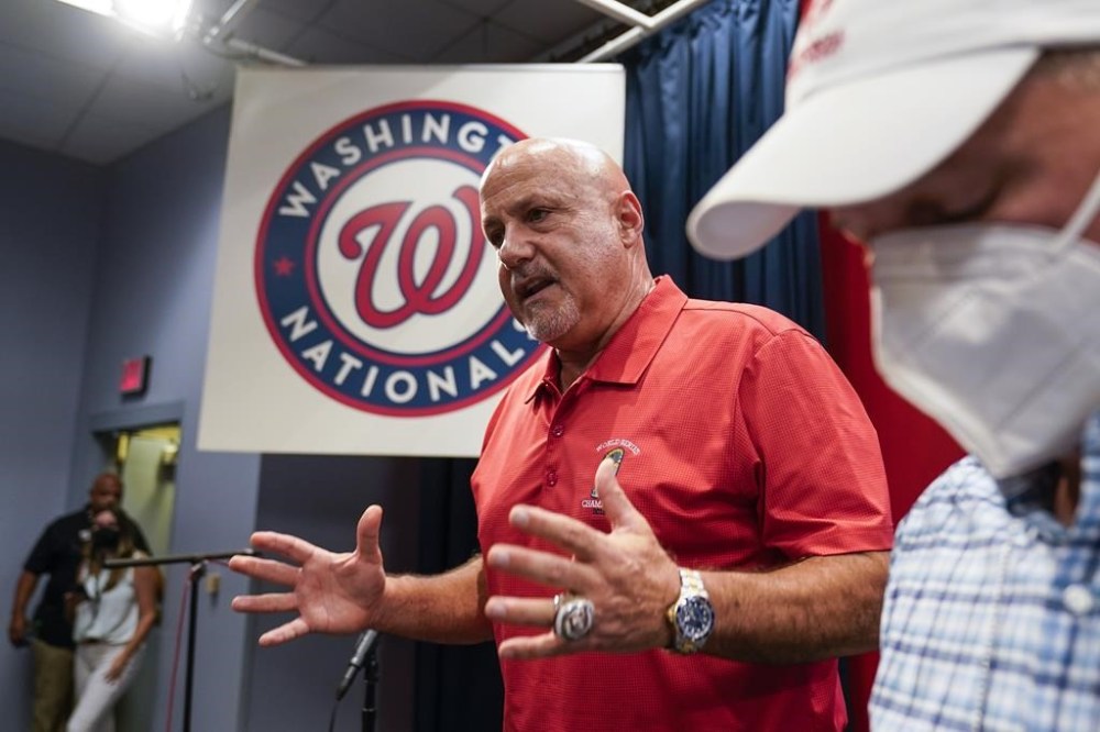 Washington Nationals general manager Mike Rizzo speaks with reporters about the team's recent trades before a baseball game against the New York Mets at Nationals Park, Tuesday, Aug. 2, 2022, in Washington. (AP Photo/Alex Brandon)