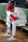 Philadelphia Phillies relief pitcher Connor Brogdon (75) sits on the bench after the Phillies allowed two run in the third inning of a baseball game against the Atlanta Braves Tuesday, Aug. 2, 2022, in Atlanta. (AP Photo/John Bazemore)