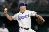 Texas Rangers starting pitcher Spencer Howard throws to the Baltimore Orioles in the first inning of a baseball game, Tuesday, Aug. 2, 2022, in Arlington, Texas. (AP Photo/Tony Gutierrez)