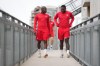 Canadian national men's soccer team defenders Kamal Miller, left, and Doneil Henry arrive for a training session for a CONCACAF Nations League match against Curacao, in Vancouver, on Tuesday, June 7, 2022. Henry, a Brampton, Ont., native became the first player from the Toronto FC academy to graduate to the first team when he signed a pro contract in August 2010. THE CANADIAN PRESS/Darryl Dyck