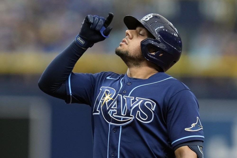 Tampa Bay Rays' Rene Pinto reacts after his single off Toronto Blue Jays starting pitcher Yusei Kikuchi during the third inning of a baseball game Wednesday, Aug. 3, 2022, in St. Petersburg, Fla. (AP Photo/Chris O'Meara)