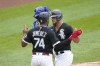 Chicago White Sox's Jose Abreu, right, celebrates his three-run homer off Kansas City Royals starting pitcher Brady Singer with Eloy Jimenez during the third inning of a baseball game Wednesday, Aug. 3, 2022, in Chicago. (AP Photo/Charles Rex Arbogast)