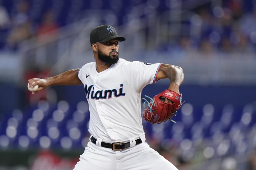 Miami Marlins' Sandy Alcantara delivers a pitch during the first inning of a baseball game against the Cincinnati Reds, Wednesday, Aug. 3, 2022, in Miami. (AP Photo/Wilfredo Lee)