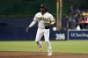 San Diego Padres first baseman Josh Bell watches during the second inning of the team's baseball game against the Colorado Rockies, Wednesday, Aug. 3, 2022, in San Diego. (AP Photo/Gregory Bull)