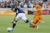 Vancouver Whitecaps forward Lucas Cavallini, left, and Houston Dynamo midfielder Griffin Dorsey fall while competing for the ball during the first half of an MLS soccer match Saturday, March 12, 2022, in Houston. THE CANADIAN PRESS/AP/Michael Wyke