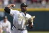 FILE - Vanderbilt pitcher Kumar Rocker (80) throws during the first inning in Game 3 of the NCAA College World Series baseball finals on June 30, 2021, in Omaha, Neb. Third overall pick Kumar Rocker signed with the Texas Rangers on Tuesday, July 26, 2022, a week after the right-handed pitcher was drafted again and a year after concerns over a physical led to him going unsigned by the New York Mets as the 10th overall pick. 
Rocker got a $5.2 million bonus from the Rangers. (AP Photo/Rebecca S. Gratz, File)