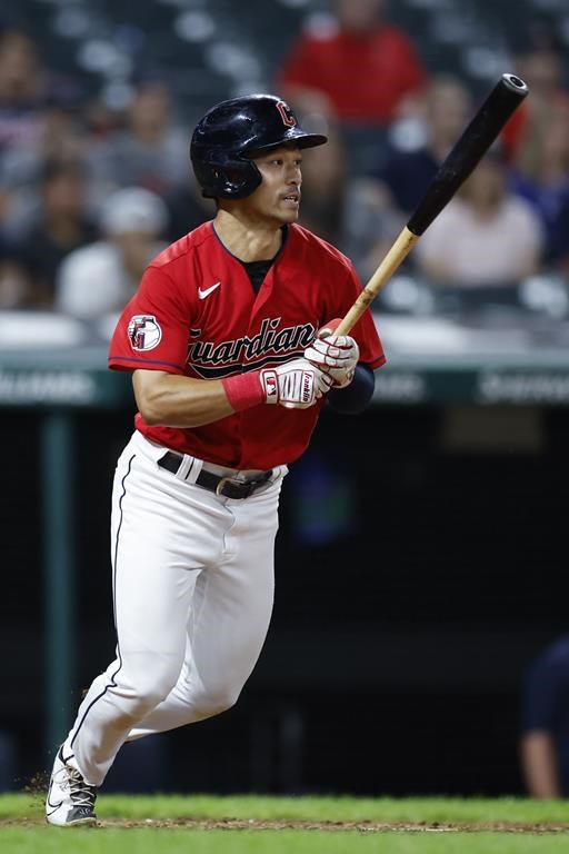Cleveland Guardians' Steven Kwan watches his single off Houston Astros relief pitcher Ryne Stanek during the eighth inning of a baseball game Thursday, Aug. 4, 2022, in Cleveland. (AP Photo/Ron Schwane)