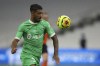 FILE -Saint-Etienne's Denis Bouanga eyes the ball during the French League One soccer match between Marseille and Saint Etienne at the Stade Velodrome in Marseille, France, Thursday, Sept.17, 2020. Forward Denis Bouanga has signed with Los Angeles FC as the Major League Soccer-leading club's third designated player. Bouanga is leaving Saint-Étienne of France's second division to join LAFC, the club announced Friday, Aug. 5, 2022 without disclosing contract terms. (AP Photo/Daniel Cole, File)