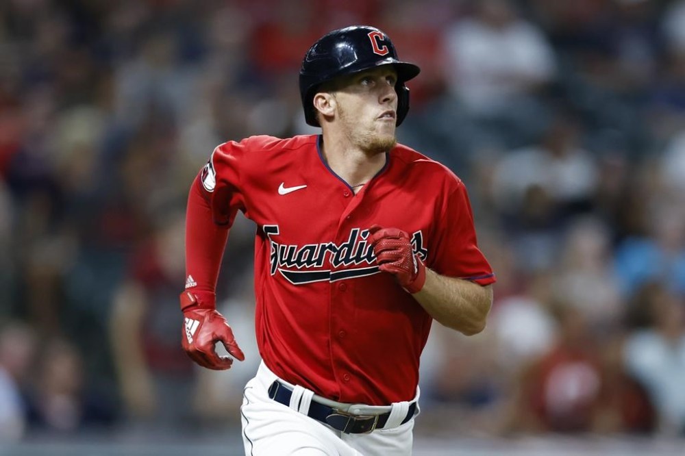 Cleveland Guardians' Myles Straw watches his RBI double off Houston Astros starting pitcher Framber Valdez during the seventh inning of a baseball game Friday, Aug. 5, 2022, in Cleveland. (AP Photo/Ron Schwane)