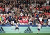 Vancouver Whitecaps' Simon Becher, left, and Ryan Raposo celebrate Becher's tying goal against the Houston Dynamo during the second half of an MLS soccer game in Vancouver, on Friday, August 5, 2022. THE CANADIAN PRESS/Darryl Dyck