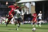 Liverpool's Thiago, left, and Fulham's Neeskens Kebano vie for the ball during the English Premier League soccer match between Fulham and Liverpool at Craven Cottage stadium in London, Saturday, Aug. 6, 2022. (AP Photo/Ian Walton)