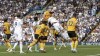 Wolverhampton Wanderers' Nathan Collins heads at goal during the English Premier League soccer match between Leeds United and Wolverhampton Wanderers, at the Elland Road in Leeds, England, Saturday, Aug. 6, 2022. (Ian Hodgson/PA via AP)