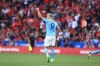 Manchester City's Erling Haaland celebrates after his teammate Julian Alvarez scores his side's opening goal during the FA Community Shield soccer match between Liverpool and Manchester City at the King Power Stadium in Leicester, England, Saturday, July 30, 2022. (AP Photo/Leila Coker)