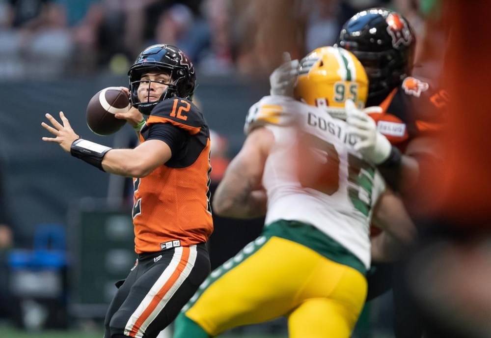 B.C. Lions quarterback Nathan Rourke passes during the first half of CFL football game against the Edmonton Elks in Vancouver, on Saturday, August 6, 2022. THE CANADIAN PRESS/Darryl Dyck