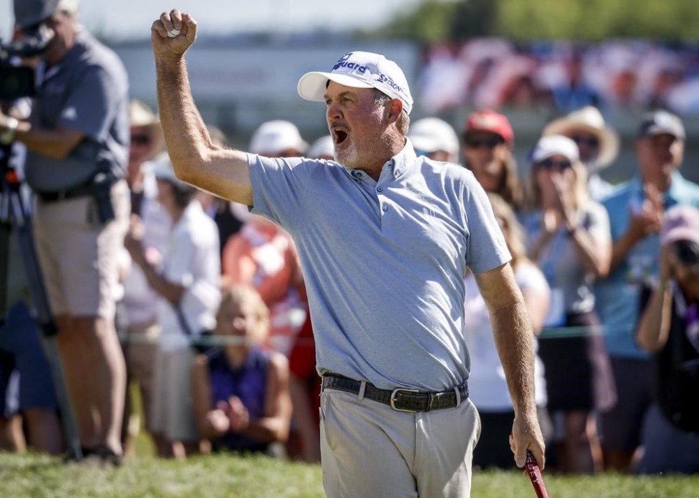 Jerry Kelly, of the United States, celebrates his victory at the PGA Tour Champions Shaw Charity Classic golf event in Calgary, Alta., Sunday, Aug. 7, 2022.THE CANADIAN PRESS/Jeff McIntosh