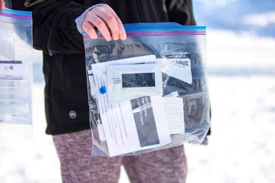 People pick up rapid tests at a COVID-19 testing site last month. (Mikaela MacKenzie / Winnipeg Free Press files)