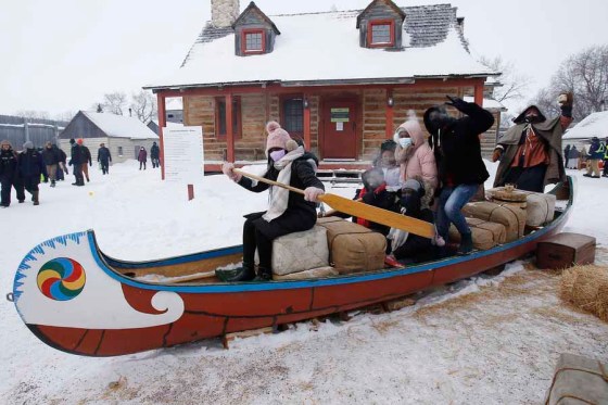 JOHN WOODS / WINNIPEG FREE PRESSRebecca Augustin (from left), David Ndaruhutse, Venita Uwase, Liliane Uwumutima, Aunice Augustin and Kevin Ruganzu in a canoe at the Festival du Voyageur on Monday. (John Woods / Winnipeg Free Press)