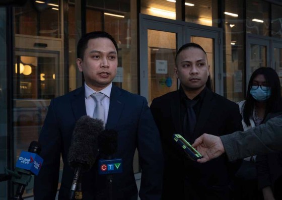 Jessica LeeEdward Balaquit, son of Eduardo Balaquit, speaks outside the law courts on Wednesday night. (Jessica Lee / Winnipeg Free Press)