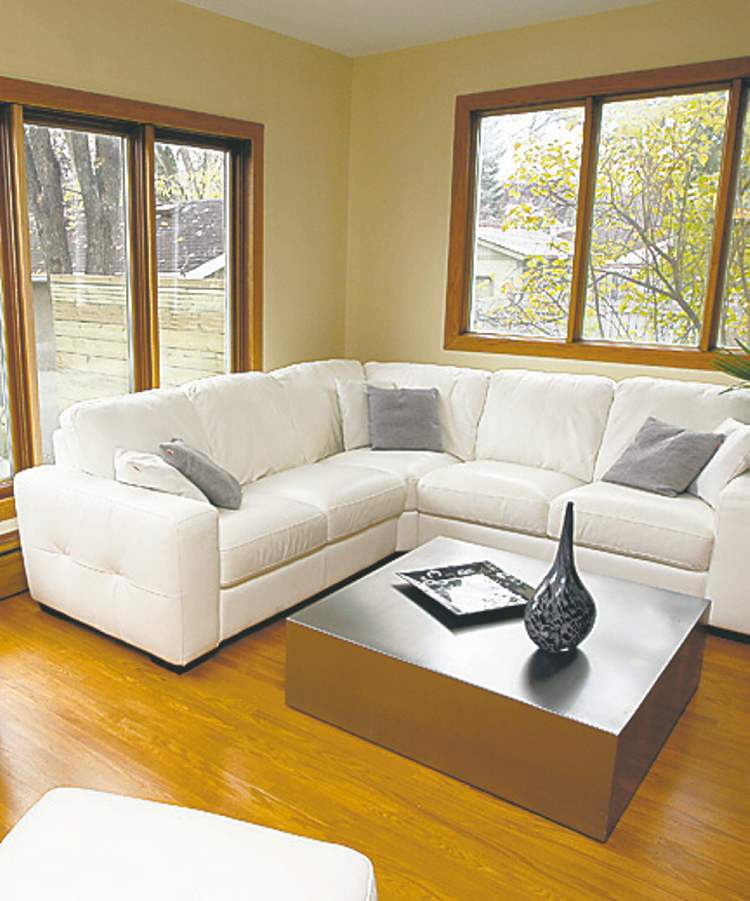 The feature that stands out most -- aside from the new red oak hardwoods that run through the living room and dining room areas -- is all the windows that surround the main level.