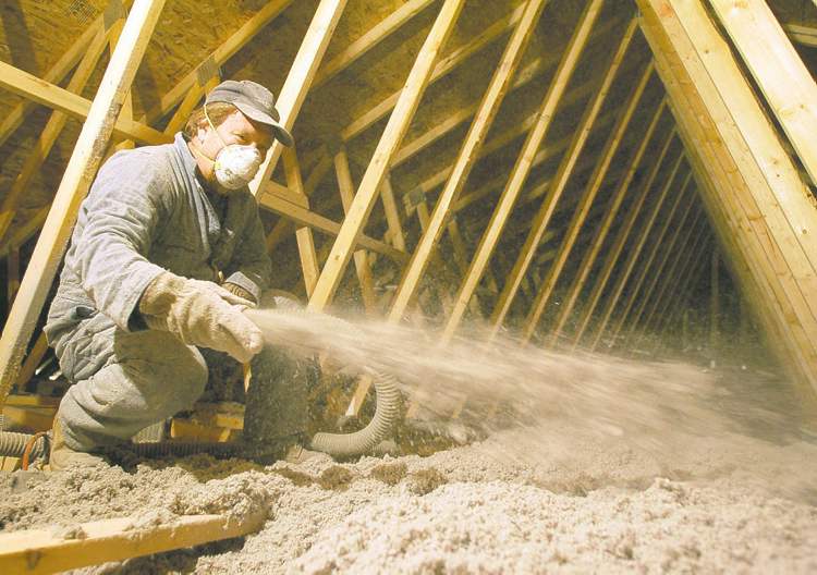 AP
Cellulose insulation, made of recycled newspaper with an added fire retardant, is a good choice for people who want to install a relatively low-cost insulation that can be blown into all the nooks and crannies that are difficult to reach with batts.