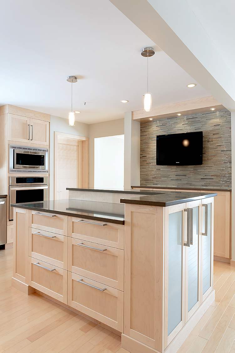 The newly renovated kitchen features an island.