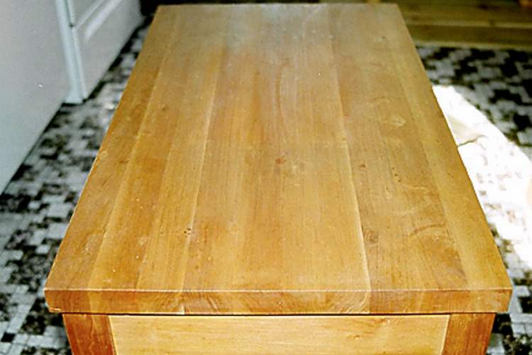 Cherry face-grain butcher-block countertop on a moveable island.