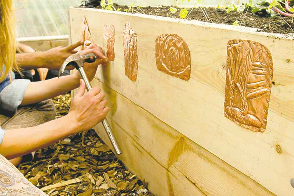 Wicking beds are raised garden boxes that can be easily seeded, weeded and harvested from. An impermeable barrier under the soil serves as a reservoir.