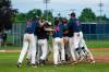 ETHAN CAIRNS / WINNIPEG FREE PRESS The Elmwood Giants rush onto the field to celebrate their fifth Manitoba Junior Baseball Championship win after their game against the St, James A’s at Koski field in Winnipeg on Saturday, July 30, 2022