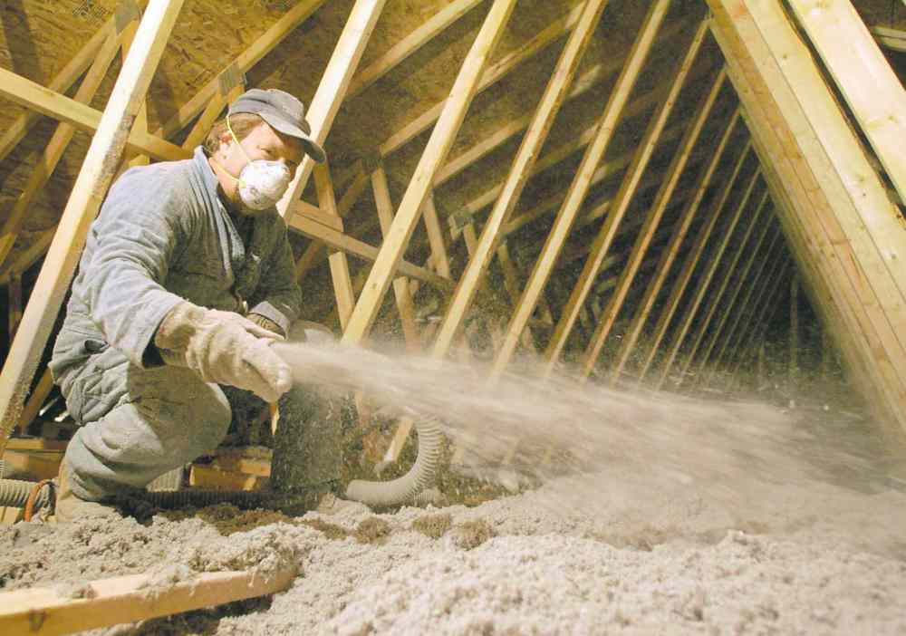 CP
Although cellulose insulation like the product being blown into the attic of this home is now the preferred method, many older homes were insulated with vermiculite insulation. It is now generally believed that vermiculite is harmless if left in a sealed attic, but hazardous if it is disturbed.