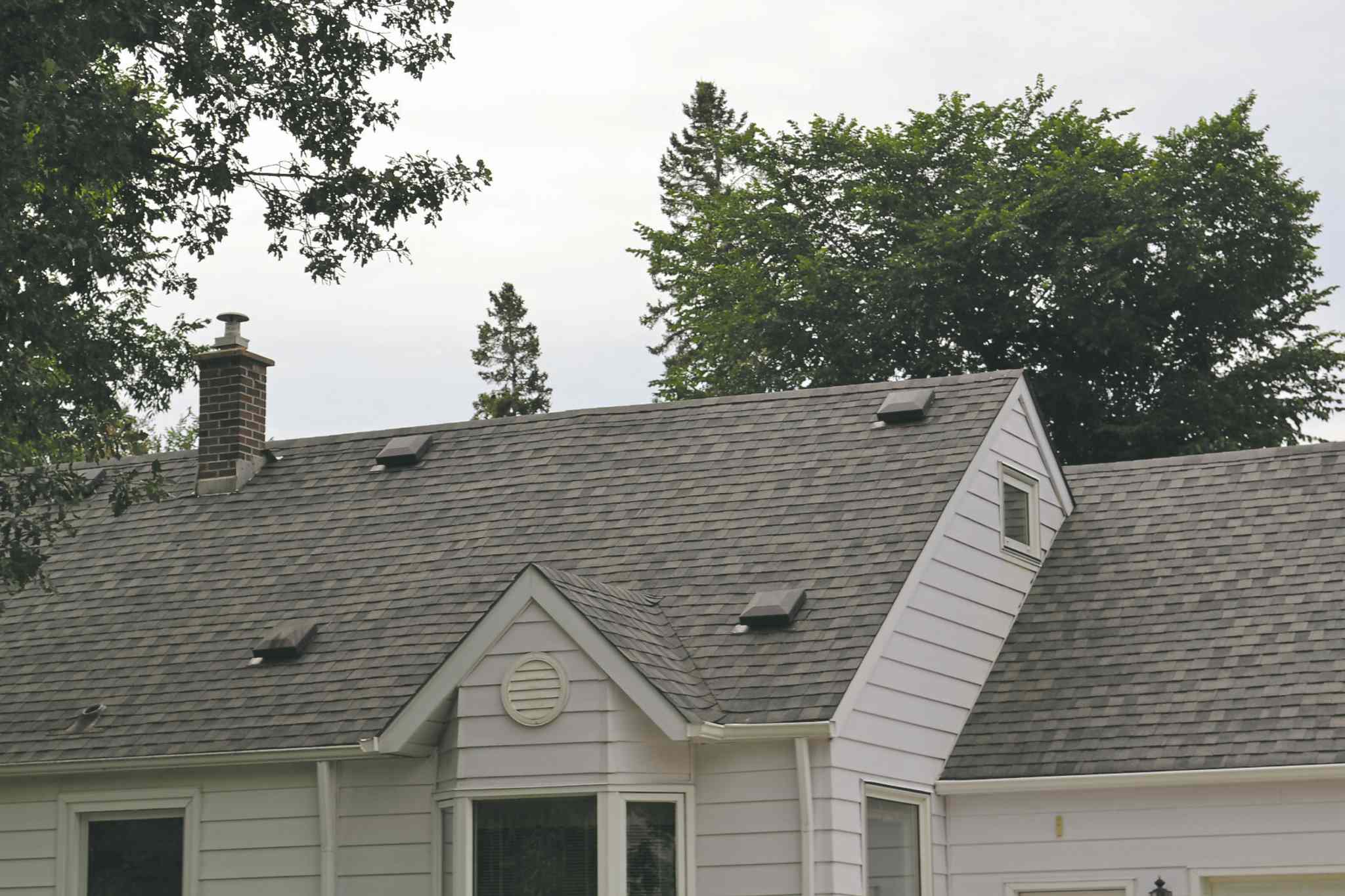 Fibreglass laminated shingles best roofing bang for buck Winnipeg