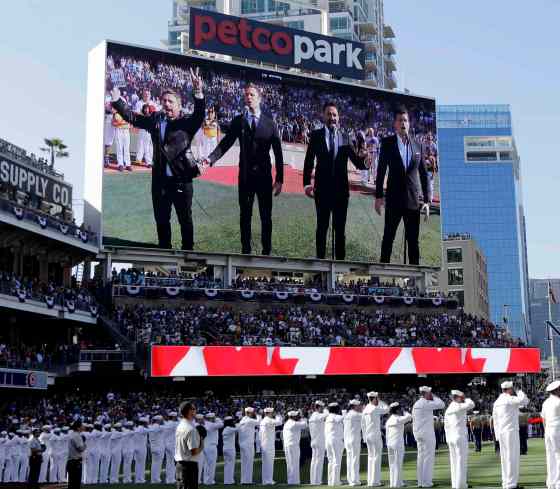 Gregory Bull / The Associated PressThe Tenors, shown on the scoreboard, perform during the Canadian National Anthem prior to an MLB baseball All-Star Game in San Diego.