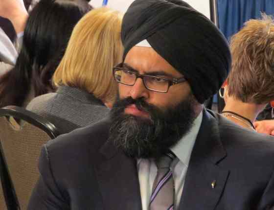 Dean Bennett / THE CANADIAN PRESSAlberta Human Services Minister Manmeet Bhullar is shown in Edmonton in  2014. Bhullar, 35, who represented Calgary-Greenway, was killed Monday after stopping on an icy central Alberta highway to help a motorist whose car had flipped in a median.