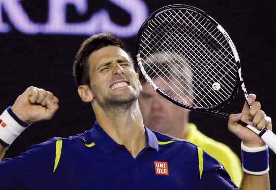 Aaron Favila / The Associated PressNovak Djokovic of Serbia celebrates after defeating Roger Federer of Switzerland in their semifinal match at the Australian Open tennis championships in Melbourne, Australia, Thursday.