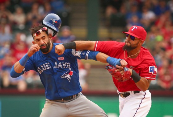 Richard W. Rodriguez / Star-Telegram / The Associated PressToronto Blue Jays Jose Bautista (19) gets hit by Texas Rangers second baseman Rougned Odor (12) after Bautista slid into second in the eighth inning of a baseball game at Globe Life Park in Arlington, Texas, Sunday.