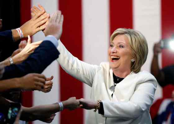 Gerald Herbert / The Associated PressDemocratic presidential candidate Hillary Clinton reacts to supporters as she arrives to address supporters at her Super Tuesday election night rally in Miami, Tuesday.