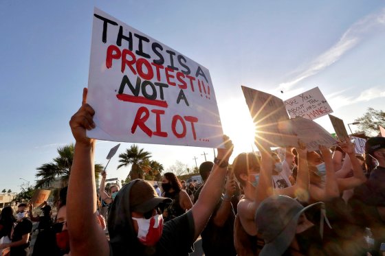 CPProtesters rally Tuesday in Phoenix, Ariz., during demonstrations over the death of George Floyd, a black man who died after being restrained by Minneapolis police officers on May 25.