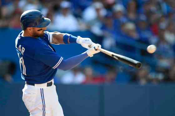 Frank Gunn / THE CANADIAN PRESSToronto Blue Jays' Kevin Pillar connects for a double to drive in the game-tying run against the Tampa Rays during eighth inning American League action in Toronto on Sunday.