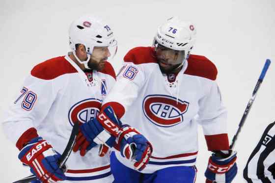 David Zalubowski / The Associated PressMontreal Canadiens defenceman Andrei Markov, left, celebrates scoring a goal with defenceman P.K. Subban against the Colorado Avalanche in the first period on Wednesday in Denver.