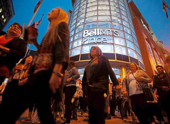 JOHN WOODS / WINNIPEG FREE PRESSPeople exit the concert venue after it was announced that Cher was not well and would not perform in Winnipeg on Tuesday.