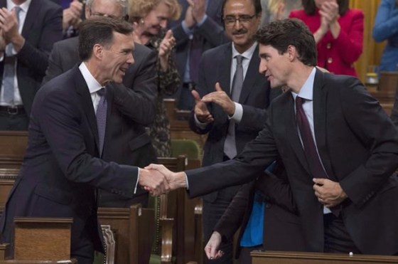 Adrian Wyld / THE CANADIAN PRESS FILESFinance Minister Bill Morneau shakes hands with Prime Minister Justin Trudeau.