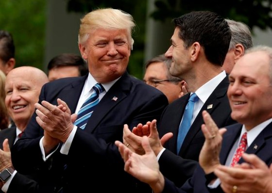 EVAN VUCCI / THE ASSOCIATED PRESSU.S. President Donald Trump talks with House Speaker Paul Ryan.