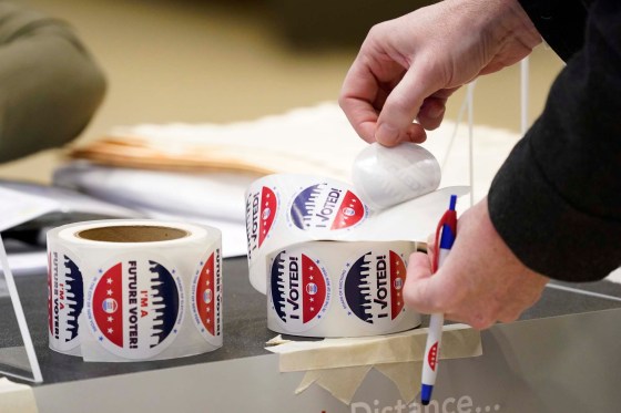 Mary Altaffer / The Associated PressA voter helps himself to an