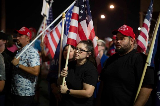Dario Lopez-MIlls / The Associated PressTrump supporters listen to a speaker as they gather outside of the Maricopa County Recorders Office Thursday, where votes in the general election are being counted in Phoenix.
