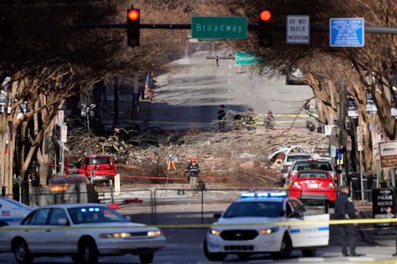 CPInvestigators continue to examine the site of an explosion in Nashville, Tenn., Sunday. (Mark Humphrey / The Associated Press)